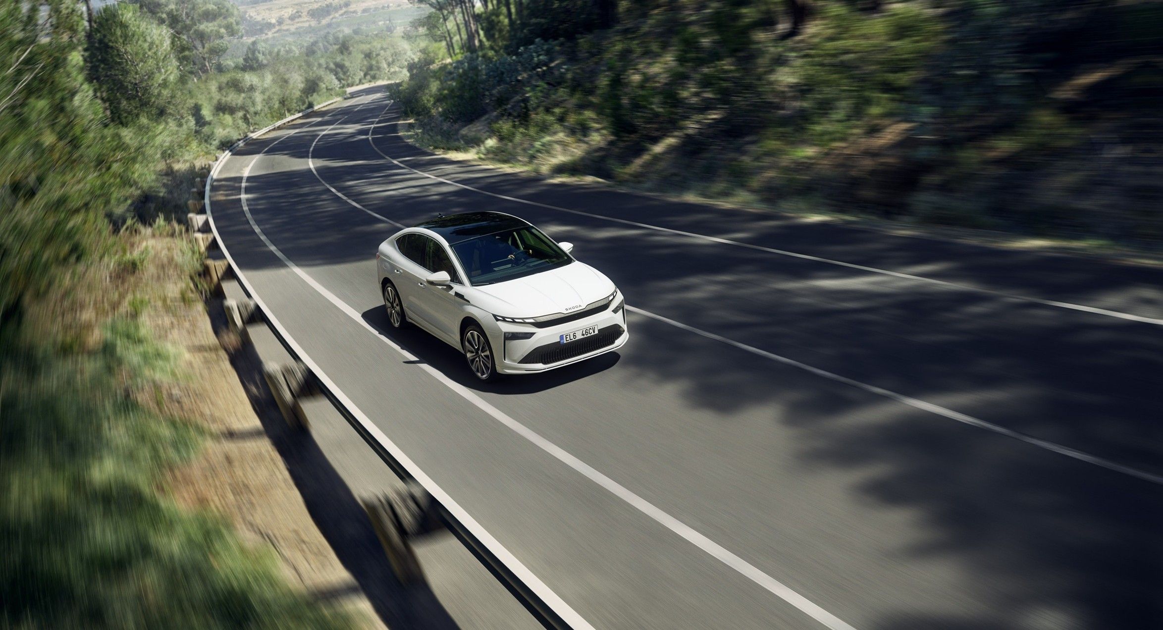 641d1c8e-904b-43b0-a2ec-1e6bdb0c4b45-New Enyaq Coupe 2025 Launch Beauty Shot 2 Forest Driving 2 JPG.jpg